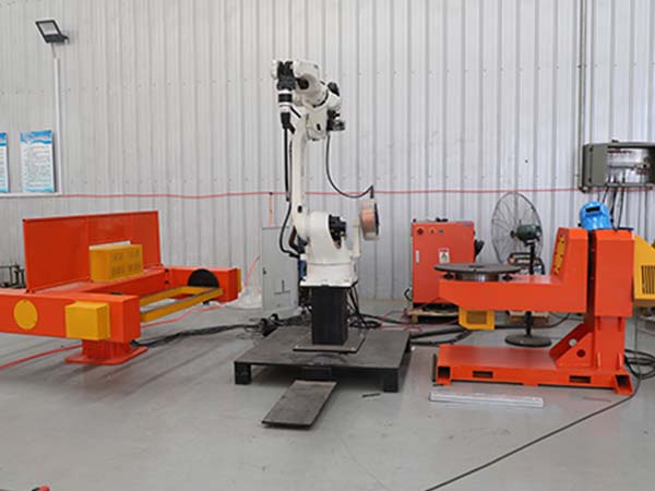 工业机器人焊接工作站完成批量焊接生产